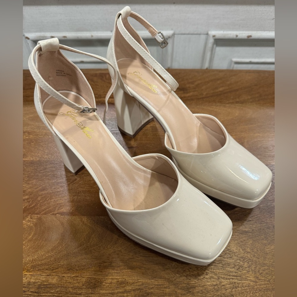 Cream paten platform Mary Jane’s -great used condition.  Size 9
